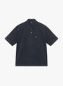 Classic Pique Polo in Black by Stüssy at Couverture & The Garbstore 
Front 