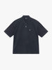 Classic Pique Polo in Black by Stüssy at Couverture & The Garbstore 
Front 