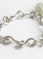 Baba Charm Bracelet in Silver by Lizzie Ames at Couverture & The Garbstore
Side View