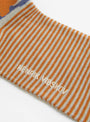 The Intern Socks Brown Coral Faces by Henrik Vibskov at Couverture & The Garbstore
Close-up