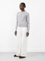 No. 300 Little 2 Cardigan from Extreme Cashmere in Grey at Couverture & The Garbstore 
Model Side 