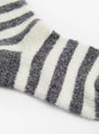 The Cosmonaut Socks in White and Grey from Howlin’ at Couverture & The Garbstore
Detail 