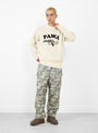 PAWA SPEED SPORTS Doggo Knit Sweater Cream at Couverture & The Garbstore
model front