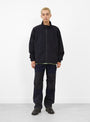  Warm Up Jacket from Stüssy in Black at Couverture & The Garbstore Model
Front 