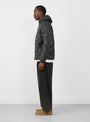Base LT Down Hooded Jacket Charcoal Black from Hiking Patrol at Couverture & The Garbstore
model side 