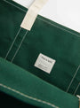 The Base Field Tote (L) from This is (an) in Forest Green and White at Couverture & The Garbstore
label 