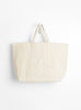 The Base Field Tote (XL) from This is (an) in White at Couverture & The Garbstore
front 
