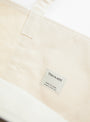 The Base Field Tote (XL) from This is (an) in White and Black at Couverture & The Garbstore 
label