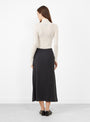 The Flat Stitch Semi Circle Knit Skirt Melange Black from Modern Weaving at Couverture & The Garbstore
model back