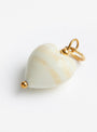 The Heart Pendant from Akua Objects in Ivory at Couverture & The Garbstore 
side