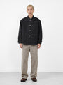The POST 46 Jacket arrives from Post O'Alls in Washed Black Pigment Dyed Canvas at Couverture & The Garbstore
model front 