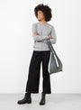The Pleco Tate L from KNA Plus arrives in Snow/Grey at Couverture & The Garbstore
model side 