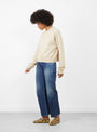 The No 170 Chou Cardigan from Extreme Cashmere arrives in Latte at Couverture & The Garbstore
model side
