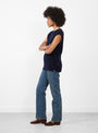 The No 455 Bos Knit Vest from Extreme Cashmere arrives in Navy at Couverture & The Garbstore
model side