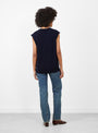 The No 455 Bos Knit Vest from Extreme Cashmere arrives in Navy at Couverture & The Garbstore
model back