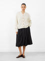 The Baby Alpaca Cardigan Natural from Cordera at Couverture & The Garbstore 
model front 
