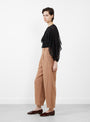The Bari Crop Trouser from Apiece Apart comes in Deep Khaki at Couverture & The Garbstore
model side 