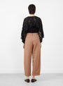 The Bari Crop Trouser from Apiece Apart comes in Deep Khaki at Couverture & The Garbstore
model back
