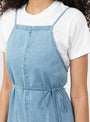 The Yumi Apron Dress from Baserange comes in Light Wash Blue at Couverture & The Garbstore
model detail