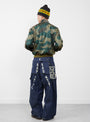 The 11.5oz Denim Jumbo Monkey Pants from Kapital come in indigo at Couverture & The Garbstore
model back