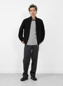 The Signature Drivers Knit from BATONER arrives in Black at Couverture & The Garbstore
model front