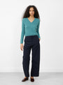 The Fitted Crop V-Neck Jumper from Himalayan Cashmere comes in Myrtle at Couverture & The Garbstore
model front