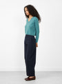 The Fitted Crop V-Neck Jumper from Himalayan Cashmere comes in Myrtle at Couverture & The Garbstore
model side