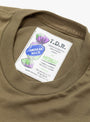 American Waste T-Shirt Army Green from TDR at Couverture & The garbstore
label