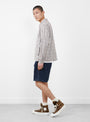 The Zip-Up Garage Jacket from Gramicci comes in Natural at Couverture & The Garbstore
model side 