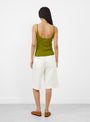 The No 471 Britney Tank Top comes in Grass from Extreme Cashmere at Couverture & The Garbstore
model back