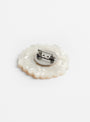 The Hand Painted Daisy Pin from Solar Eclipse at Couverture and the Garbstore
pin