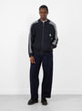 The Knitted Training Jacket comes in Faded Black from Rice Nine Ten at Couverture & The Garbstore
model front 