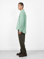 The Tencel Pearlsnap Shirt from Wythe comes in Sage at Couverture & The Garbstore
model side