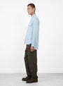 The Tencel Pearlsnap Shirt from Wythe comes in Faded Bench Blue at Couverture & The Garbstore
model side