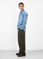 The Denim Pearlsnap Shirt from Wythe comes in Washed Indigo at Couverture & The Garbstore
model side 