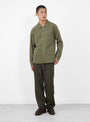 The Japanese HBT Barn Jacket from Wythe comes in Faded Olive at Couverture & The Garbstore
model front