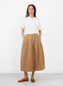 The Minty Skirt comes in Toffee Denim from Sideline at Couverture & The Garbstore
model front