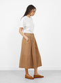 The Minty Skirt comes in Toffee Denim from Sideline at Couverture & The Garbstore
model side