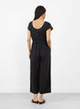 The Daisy Jumpsuit comes in Black from Sideline at Couverture & The Garbstore
model back