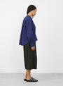 The Ovelia Shirt comes in Blue from YMC at Couverture & The Garbstore
model side