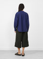 The Ovelia Shirt comes in Blue from YMC at Couverture & The Garbstore
model back