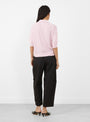 The Oda Polo Knit comes in Rosewater from Apiece Apart at Couverture & The Garbstore
model back