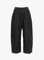 The Spa Pleat Trousers come in Black from Apiece Apart at Couverture & The Garbstore front