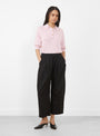 The Spa Pleat Trousers come in Black from Apiece Apart at Couverture & The Garbstore model front