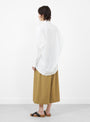 The Signature Cocoon Dress Shirt comes in Off White from 7115 by Szeki at Couverture & The Garbstore
model back