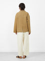 The Lapel Short Coat from 7115 by Szeki comes in Washed Tan at Couverture & The Garbstore
model back