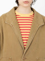 The Lapel Short Coat from 7115 by Szeki comes in Washed Tan at Couverture & The Garbstore
model detail