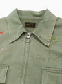 The Herringbone Hunter Drizzler Jacket Memorial Embroidery comes in Khaki from Kapital at Couverture & The Garbstore
collar