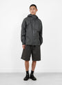 The x Mammut HS Hooded Jacket from Hiking Patrol comes in Gabbro & Black at Couverture & The Garbstore
model front 