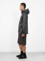 The x Mammut HS Hooded Jacket from Hiking Patrol comes in Gabbro & Black at Couverture & The Garbstore
model side